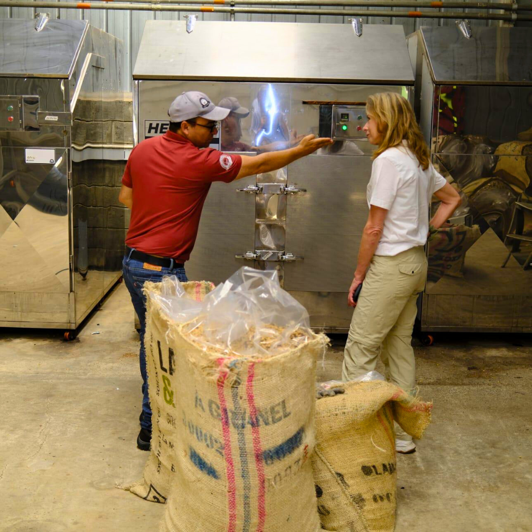 ilse and wilton benitez in front of wilton's own developped drying chambers